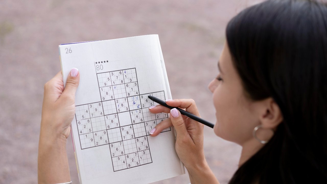 Phil or Lil of Rugrats Crossword